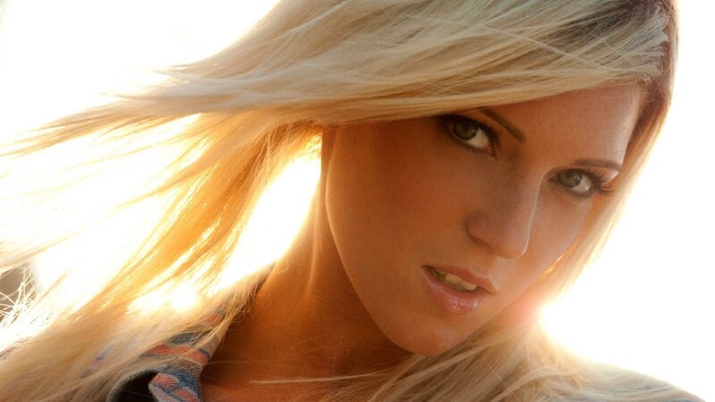woman with blonde hair in sunlight