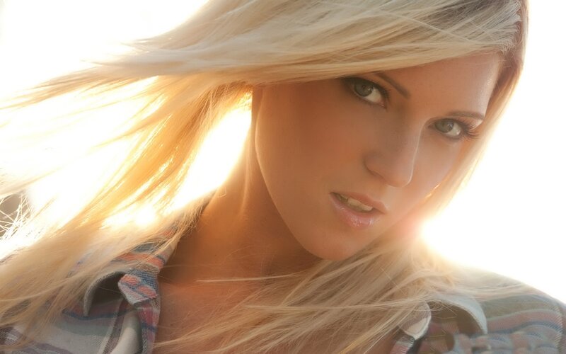 woman with blonde hair in sunlight