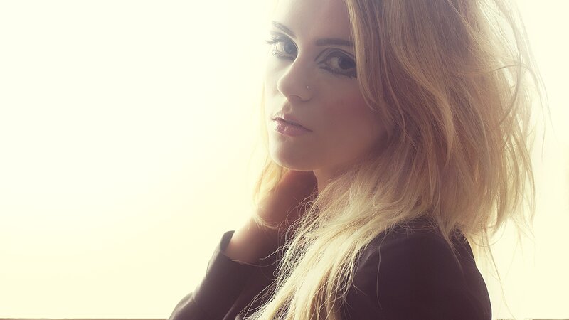 woman with blonde hair in sunlight