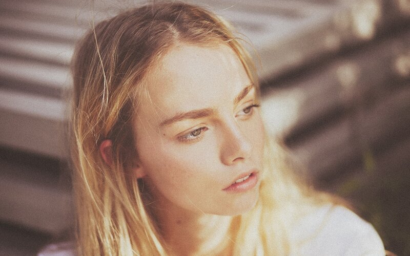 woman with blonde hair in sunlight