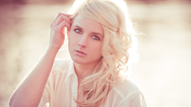 woman with blonde hair in sunlight
