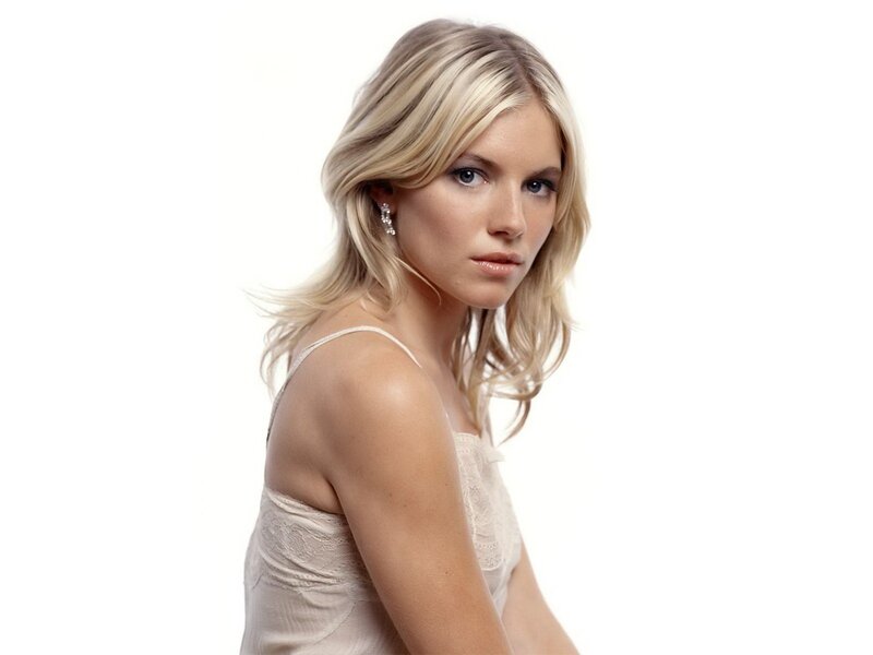 woman with blonde hair in white dress