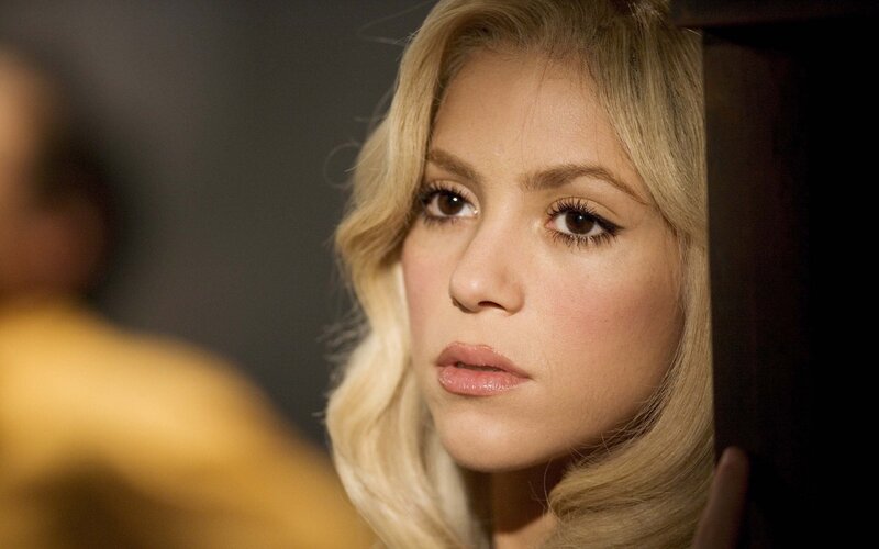 woman with blonde hair looking