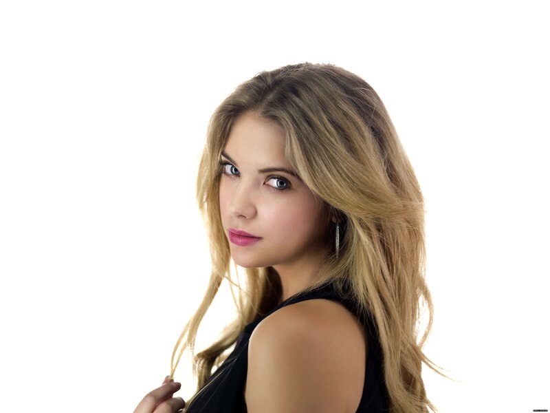 woman with blonde hair looking at camera