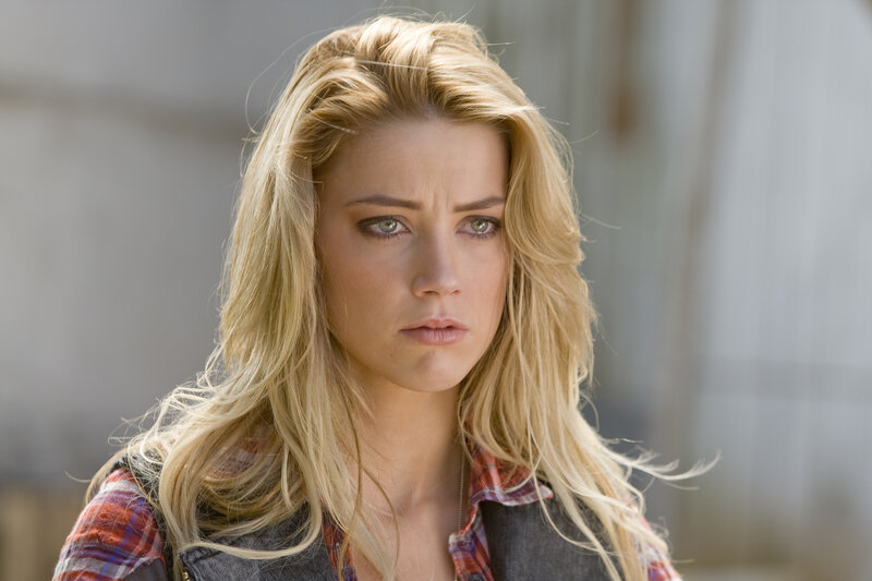 woman with blonde hair looking concerned