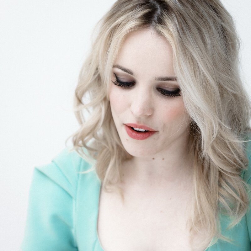 woman with blonde hair looking down