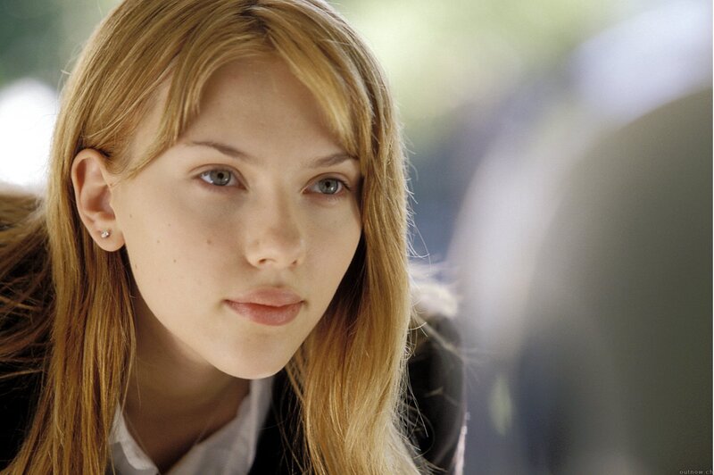 woman with blonde hair looking