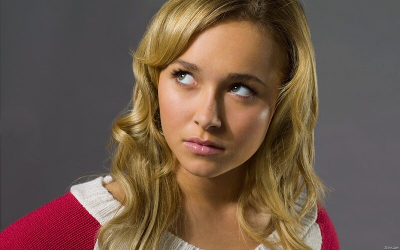 woman with blonde hair looking up