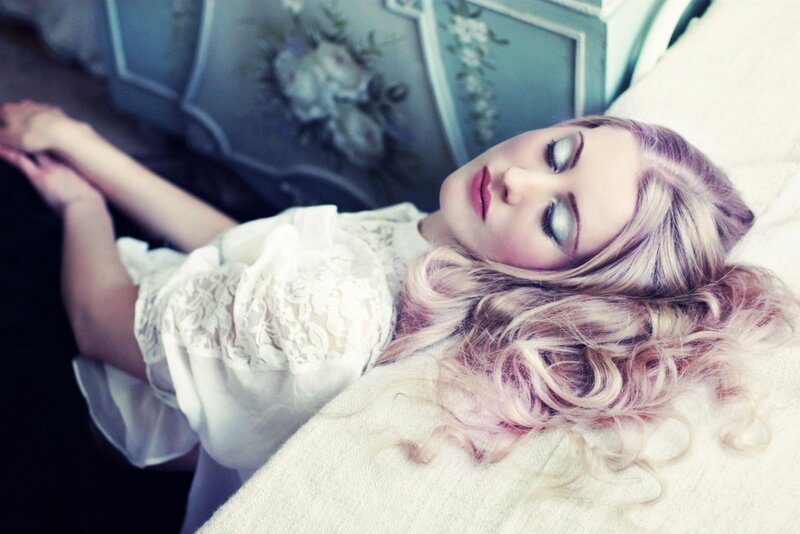 woman with blonde hair lying down