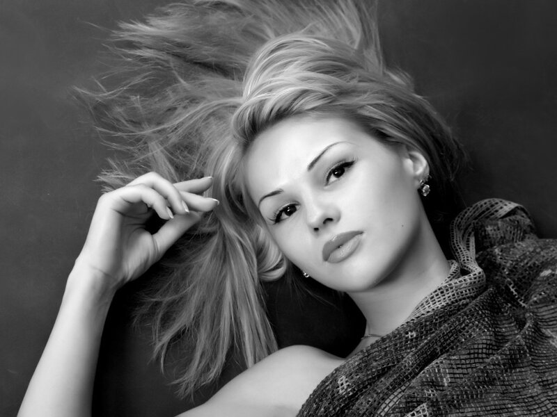 woman with blonde hair lying down