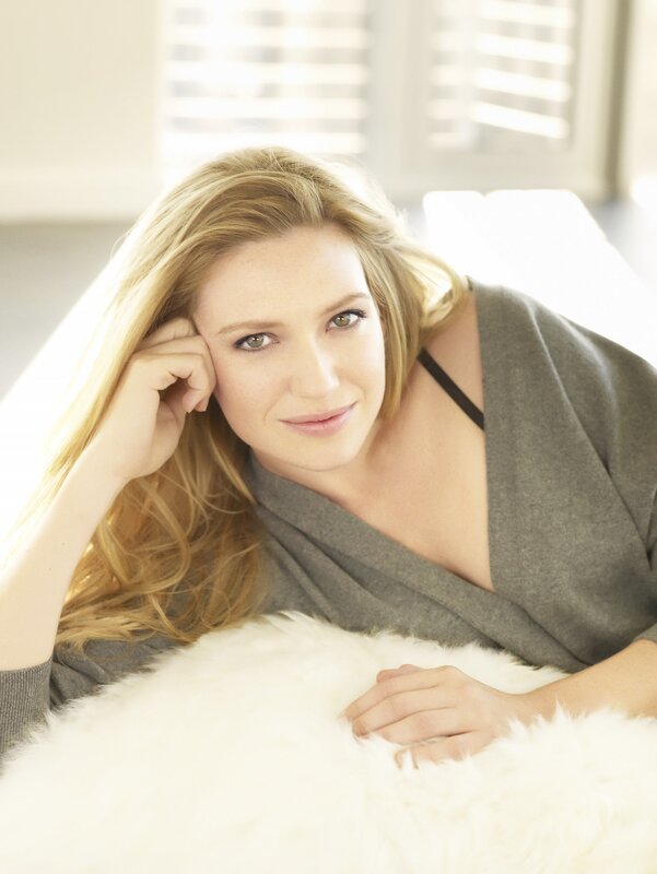 woman with blonde hair lying down