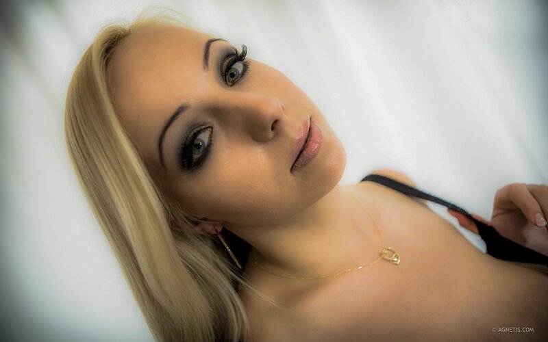 woman with blonde hair lying down