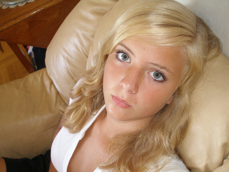 woman with blonde hair lying down