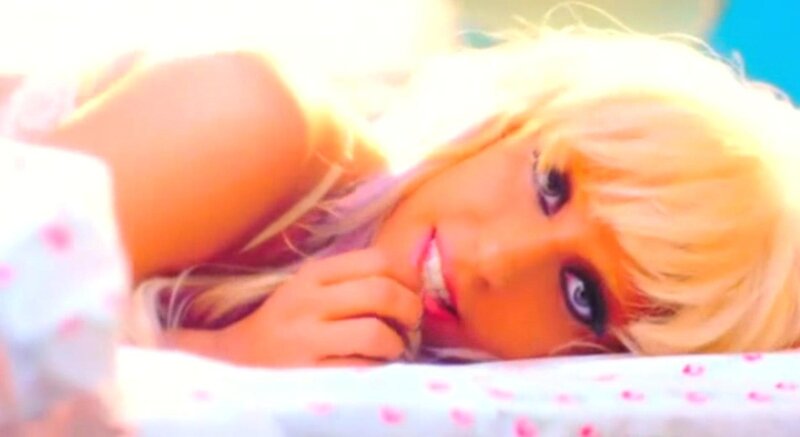 woman with blonde hair lying down