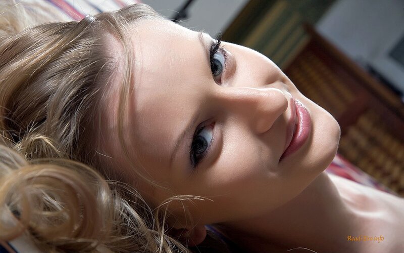 woman with blonde hair lying down