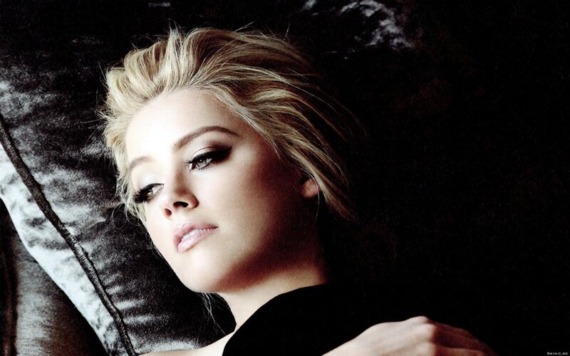 woman with blonde hair lying down
