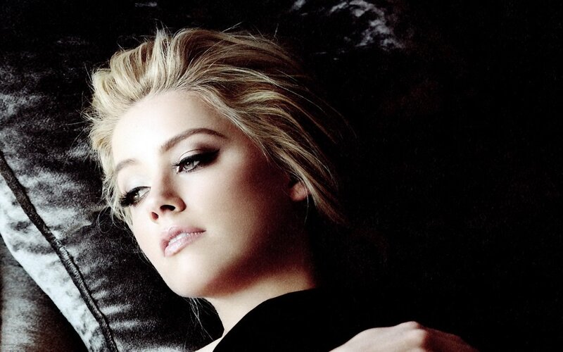 woman with blonde hair lying down