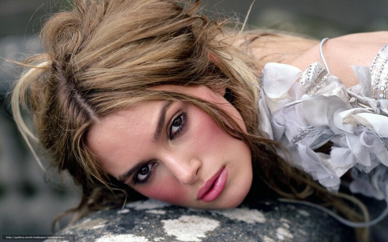 woman with blonde hair lying down