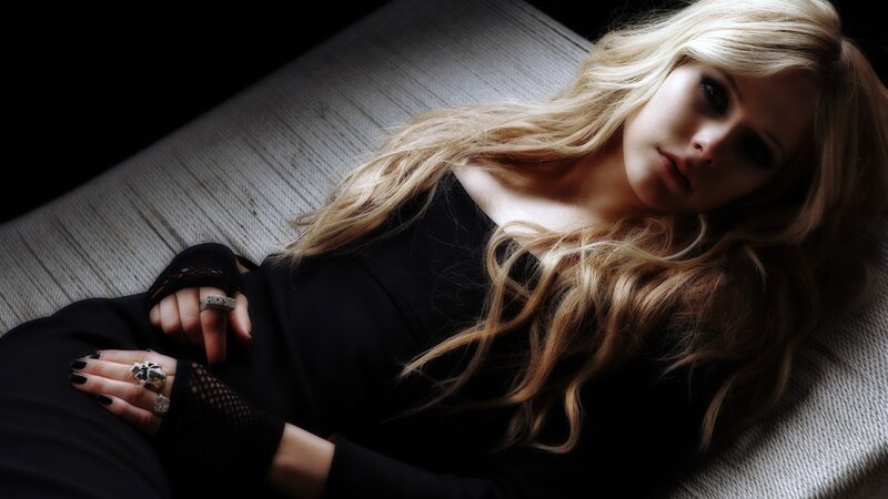 woman with blonde hair lying down