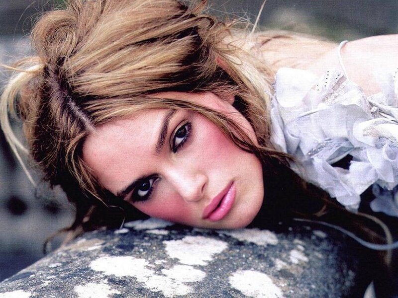 woman with blonde hair lying down
