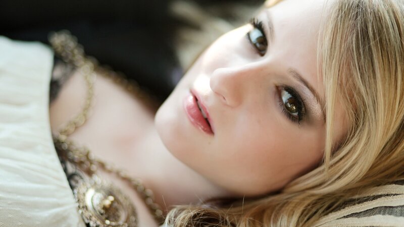 woman with blonde hair lying down