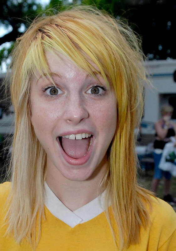 woman with blonde hair making a face