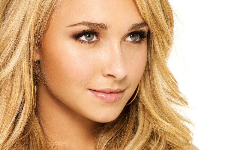 Woman with Blonde Hair — Neutral, Green Eyes