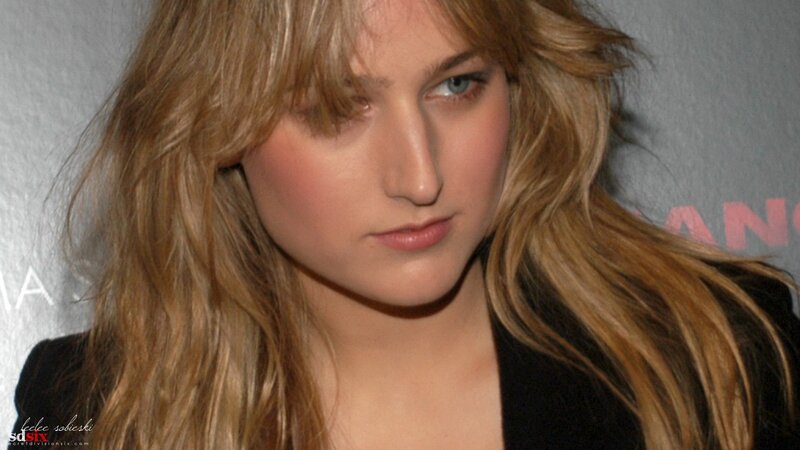 Woman with Blonde Hair — Neutral, Photograph, Black Top, Wall, Black, Gray