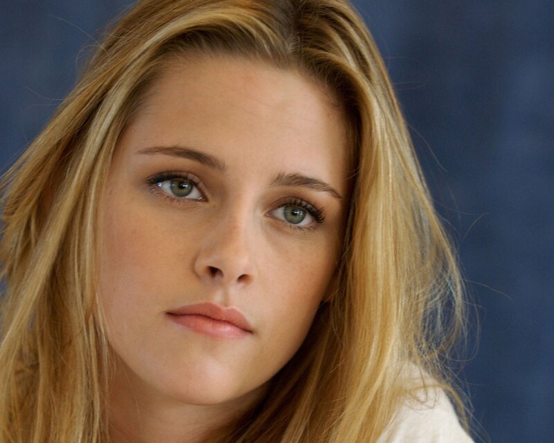 Woman with Blonde Hair — Neutral, Photograph, Blonde Hair, Green Eyes, Blue Background