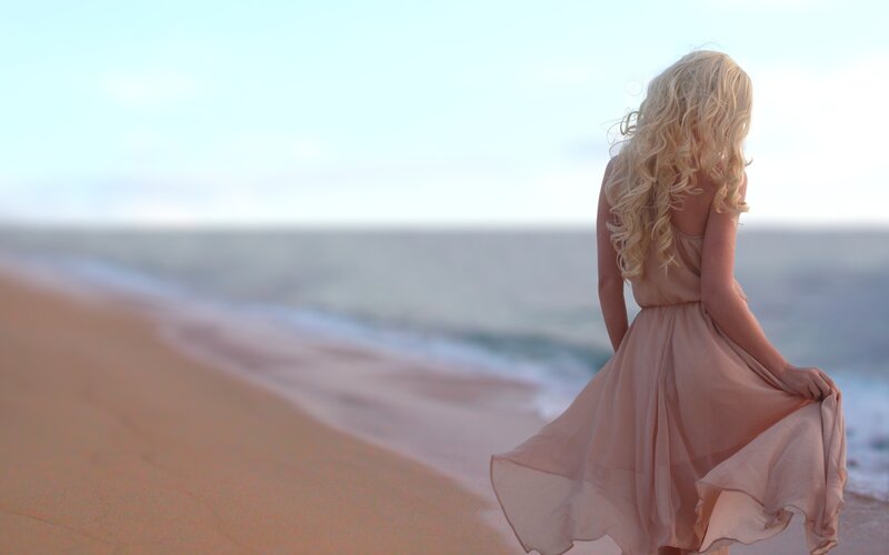 Woman with Blonde Hair — Pink, Serene, Sunset