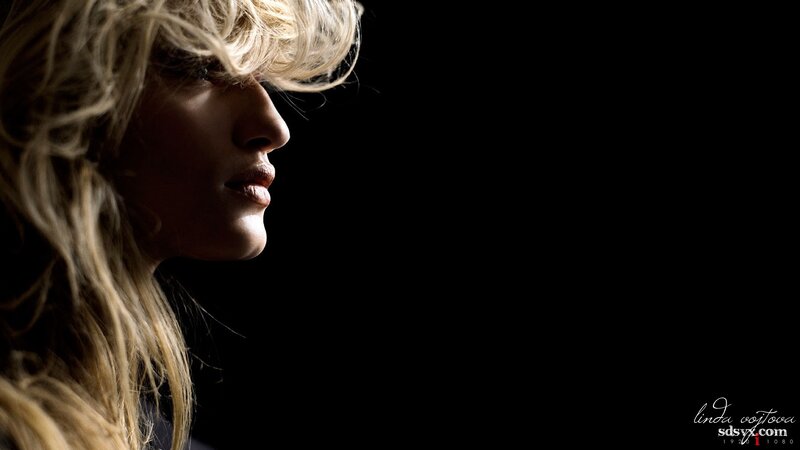 Woman with Blonde Hair — Profile