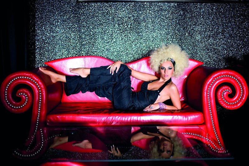 Woman with Blonde Hair — Red, Dramatic, Photograph, Red Couch