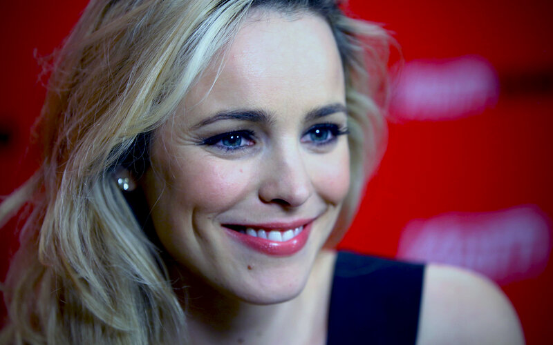 Woman with Blonde Hair — Red, Smiling, Photograph, Earring, Red Background