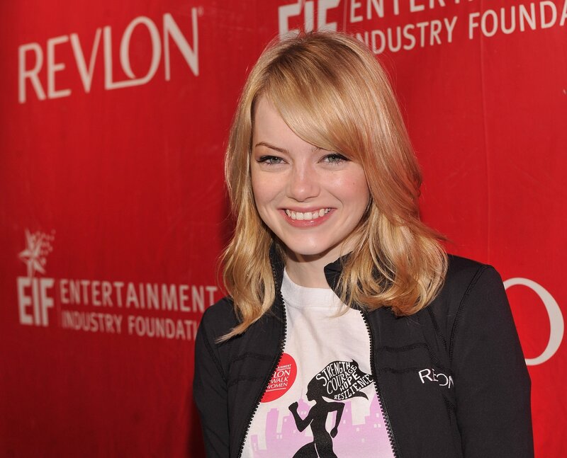 Woman with Blonde Hair — Red, Smiling, Photograph, Red Backdrop