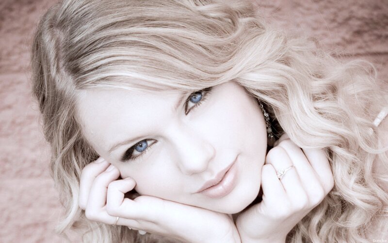 woman with blonde hair resting