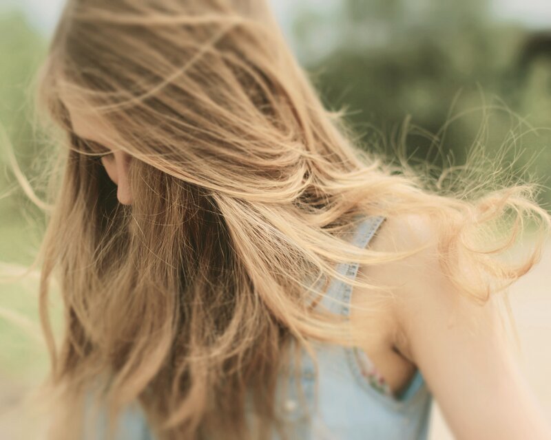 Woman with Blonde Hair — Serene, Afternoon, Photograph, Denim Top, Outdoor