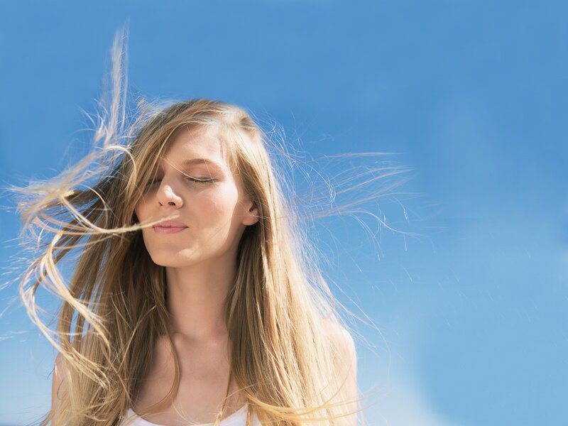 Woman with Blonde Hair — Sky