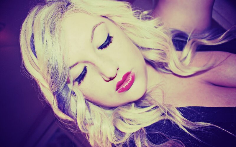 woman with blonde hair sleeping