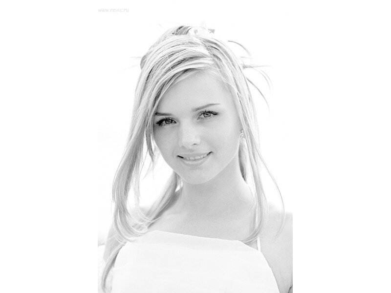 woman with blonde hair smiling