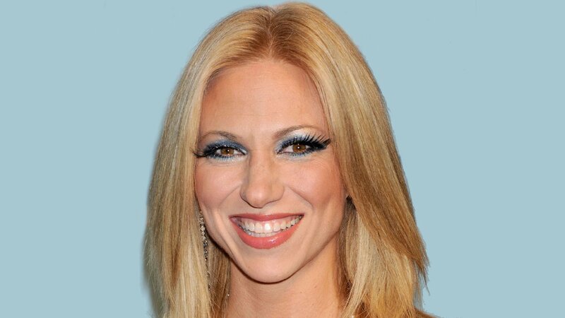 woman with blonde hair smiling