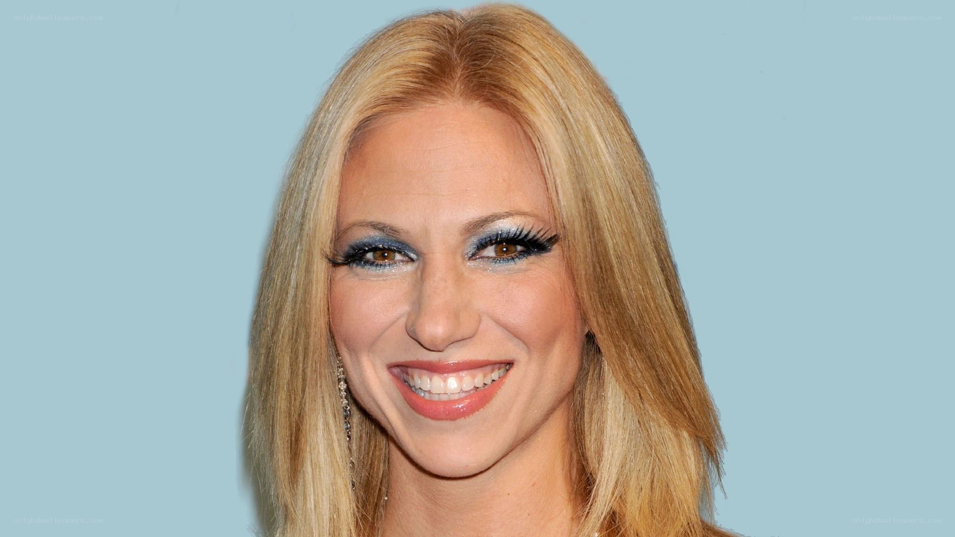 woman with blonde hair smiling