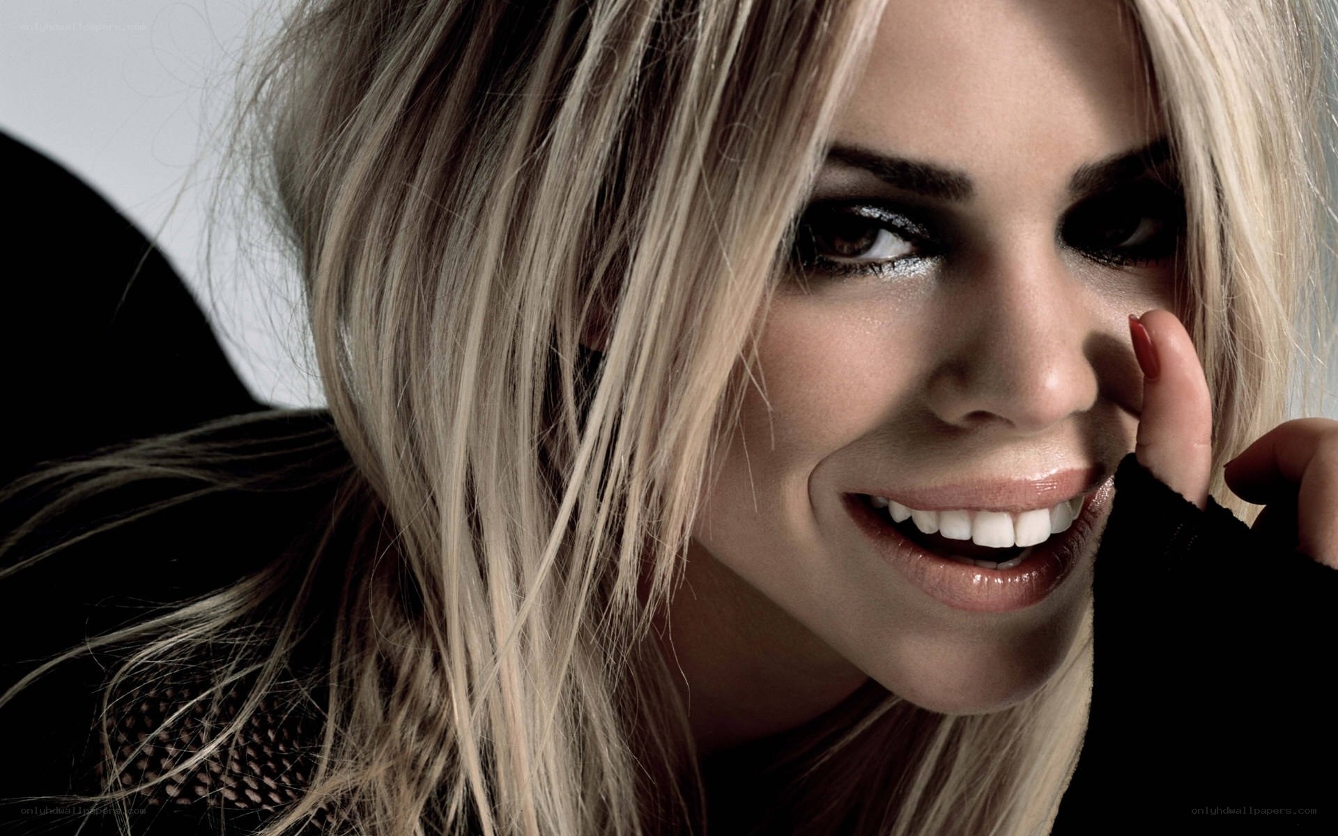 woman with blonde hair smiling