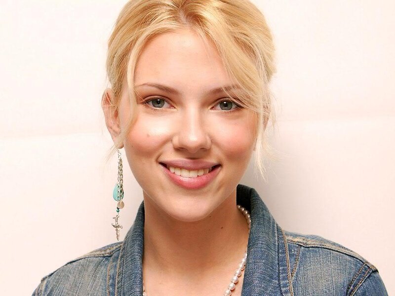 woman with blonde hair smiling