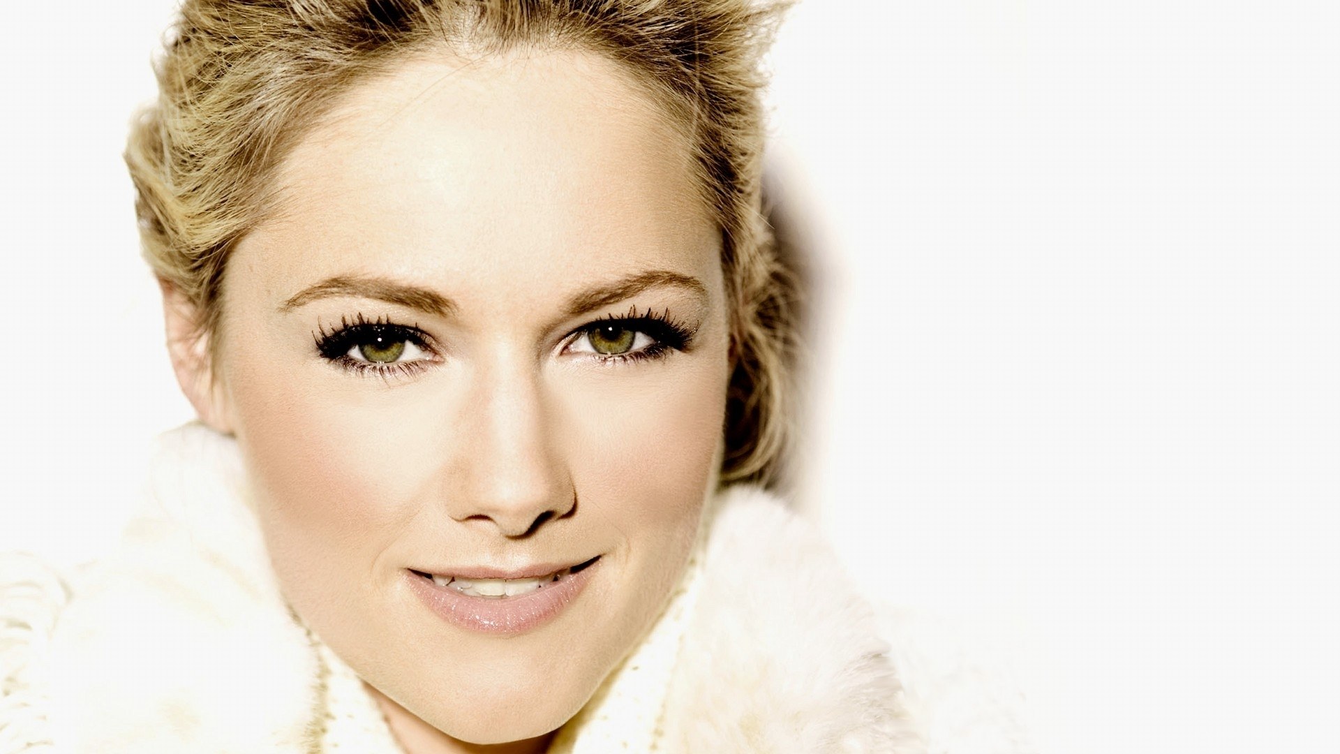 woman with blonde hair smiling