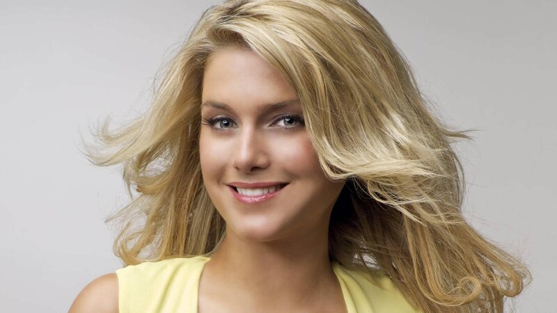 woman with blonde hair smiling