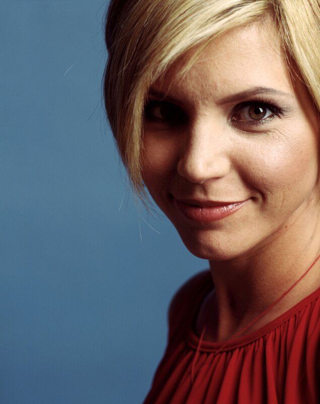 woman with blonde hair smiling