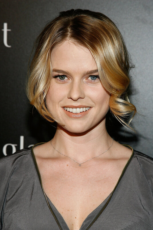 woman with blonde hair smiling