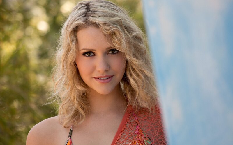 woman with blonde hair smiling