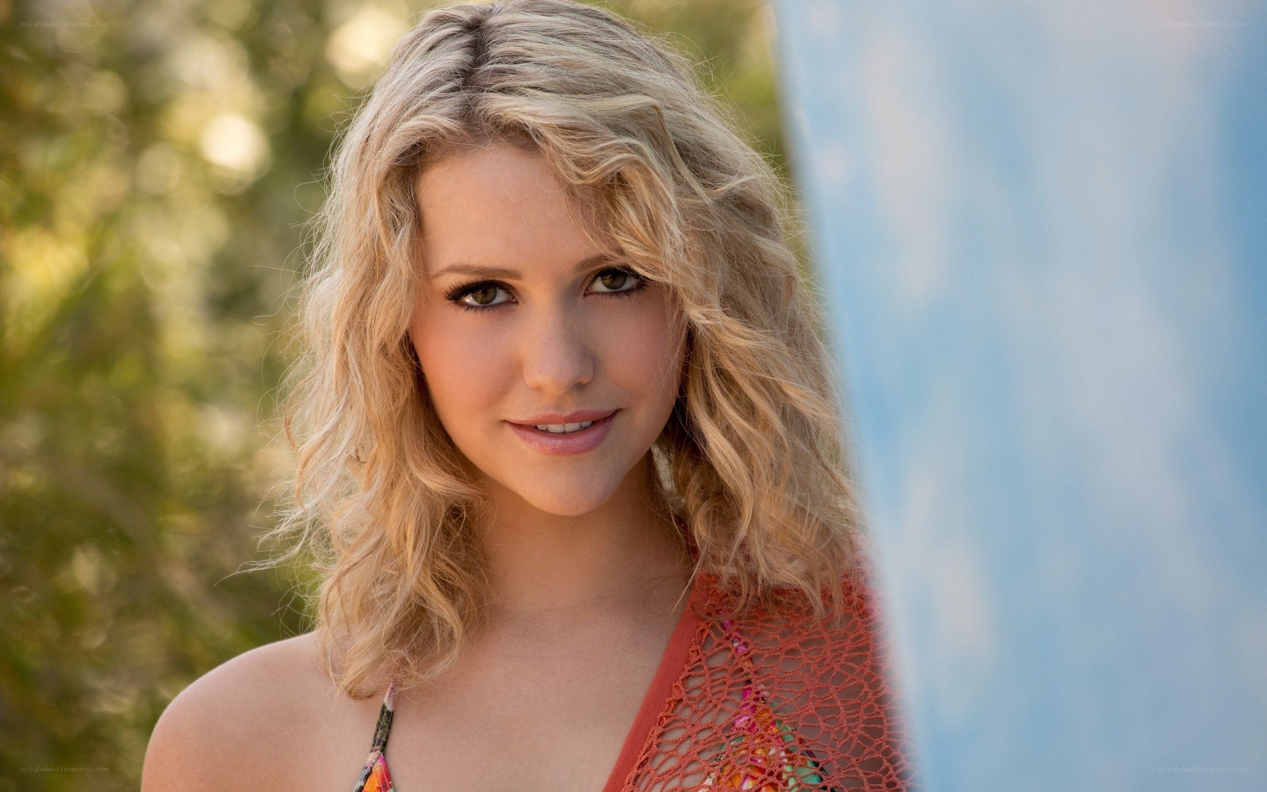 woman with blonde hair smiling