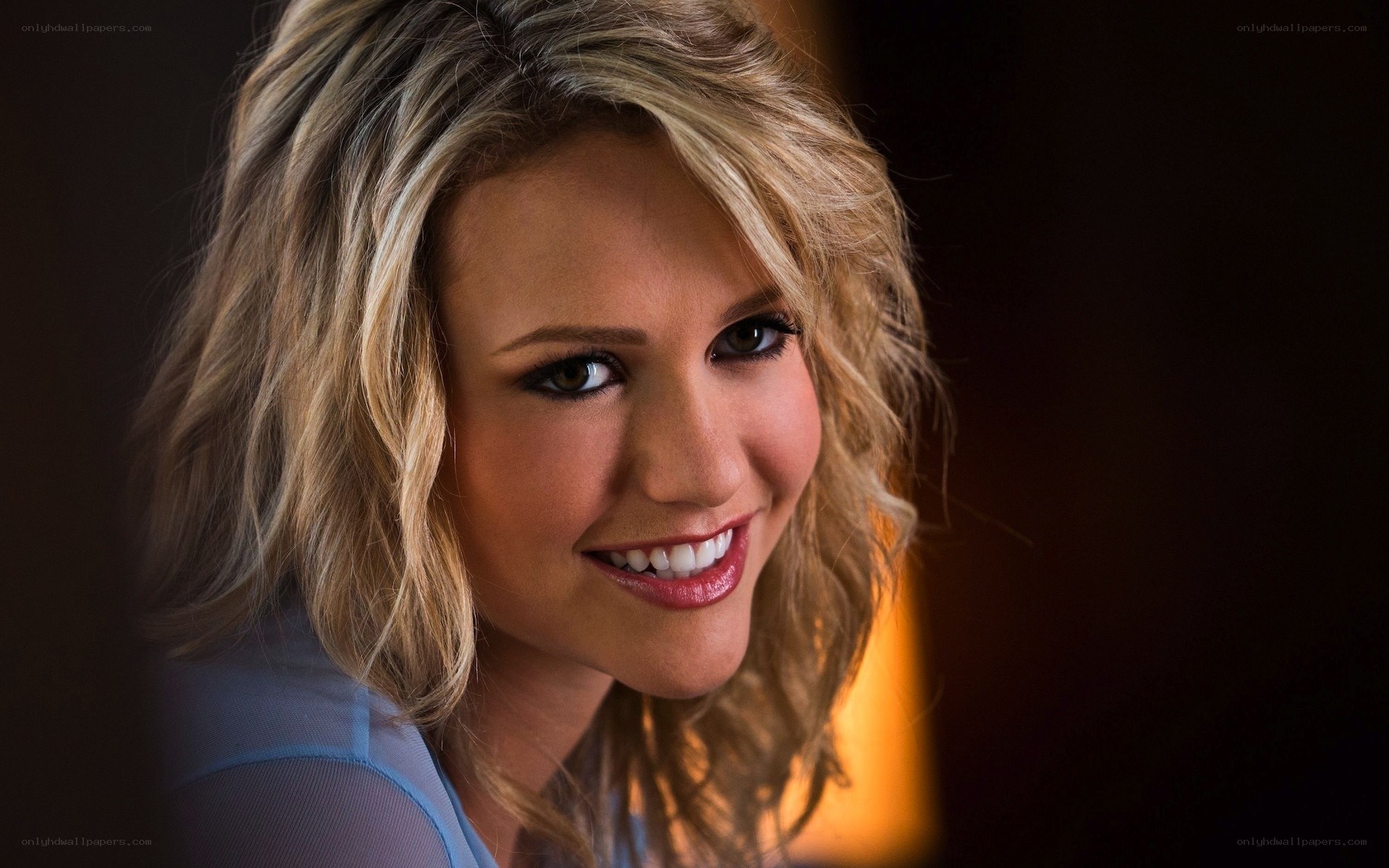 woman with blonde hair smiling